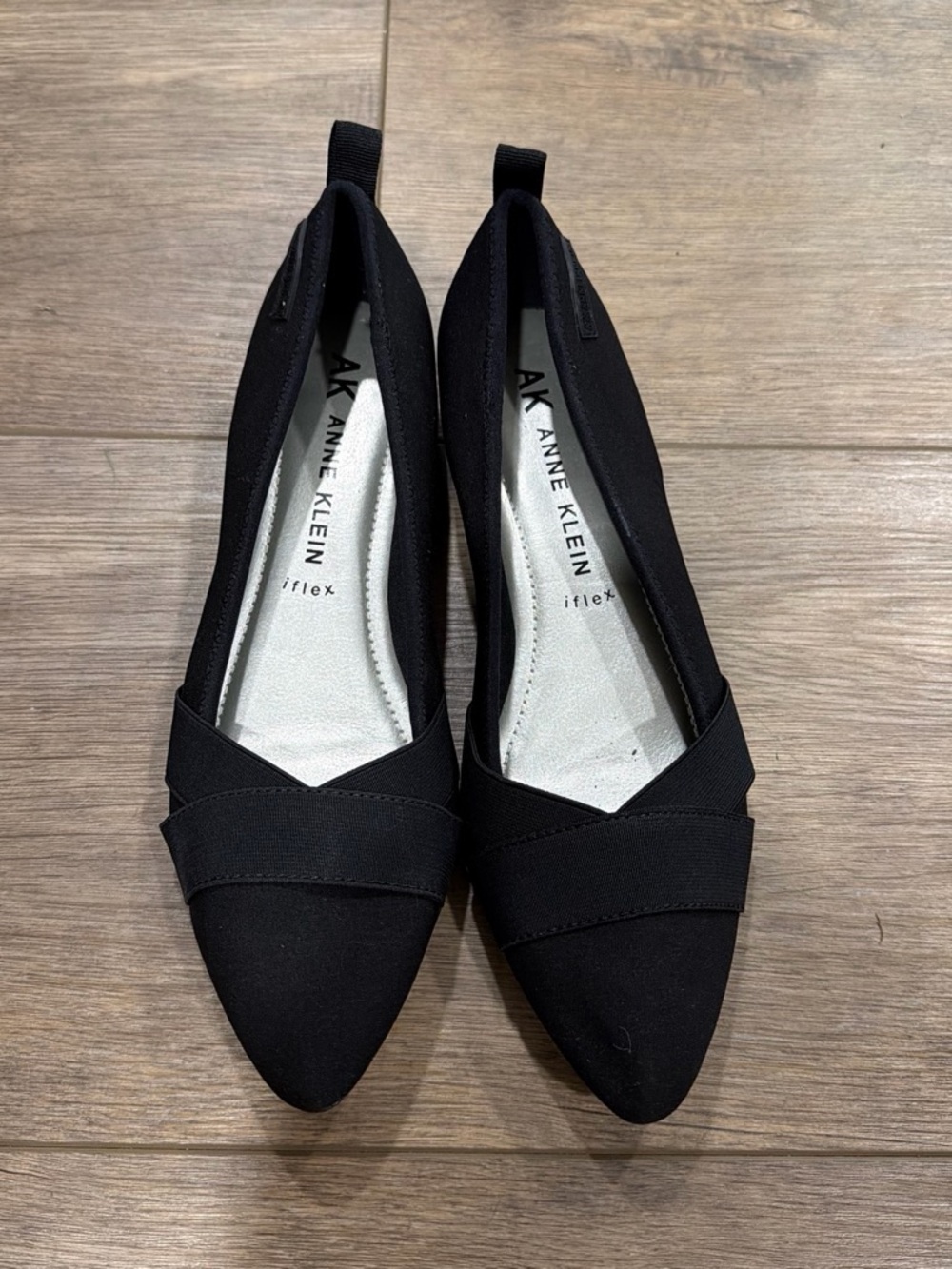 Anne Klein Black Pointed-Toe Slip Ons with Cross Band Detail